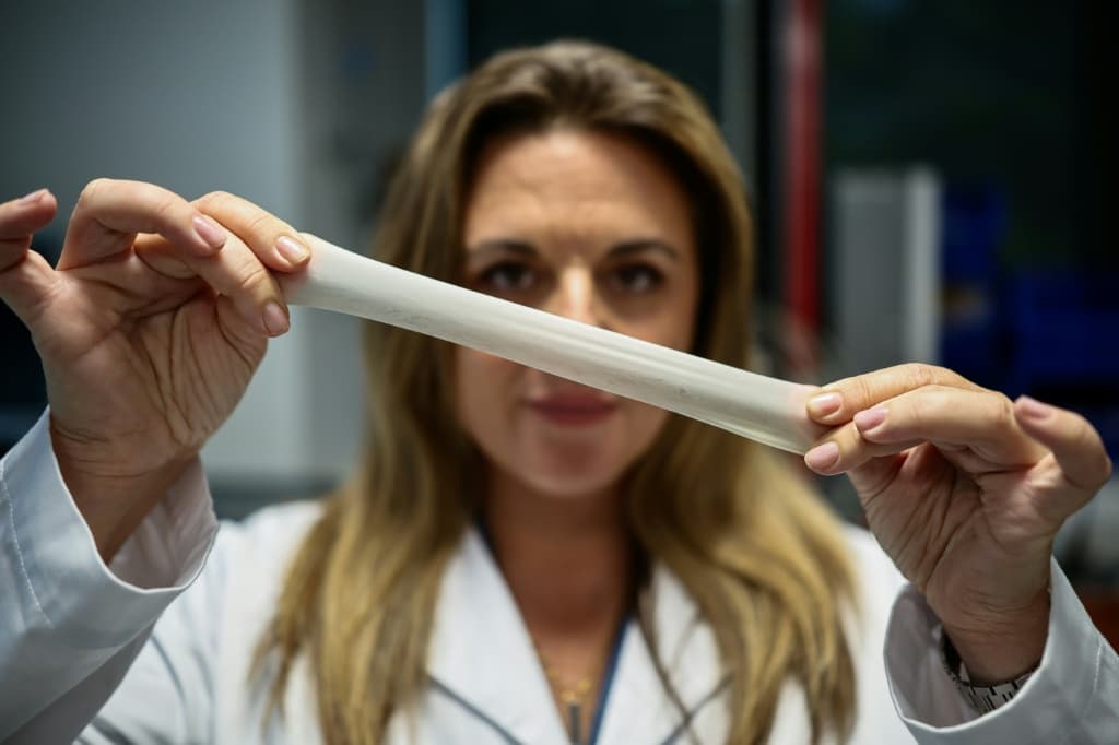 Bioloon CEO Charlotte Melia holds a sample of biodegradable rubber, which researchers say will biodegrade in nine months