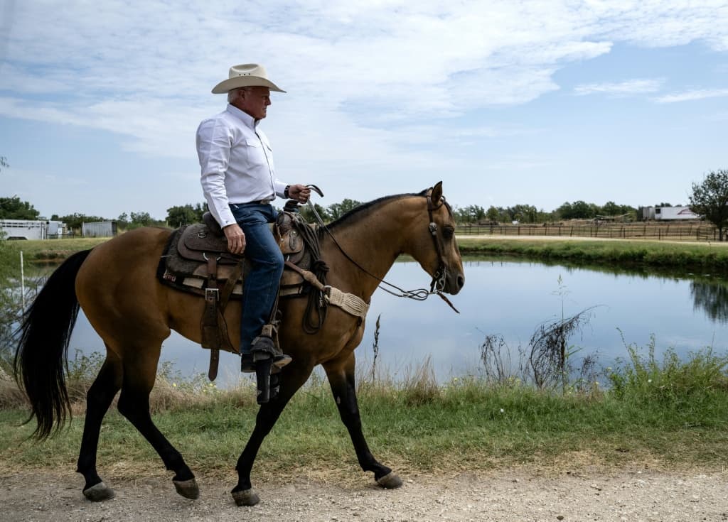 Texas Agriculture Commissioner Sid Miller, riding a horse at his ranch in Stephenville, Texas, disagrees with President Donald Trump's decision to import ground beef to ease consumer prices
